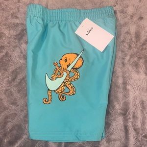 Nike teal swim trunks with octupus NWT
